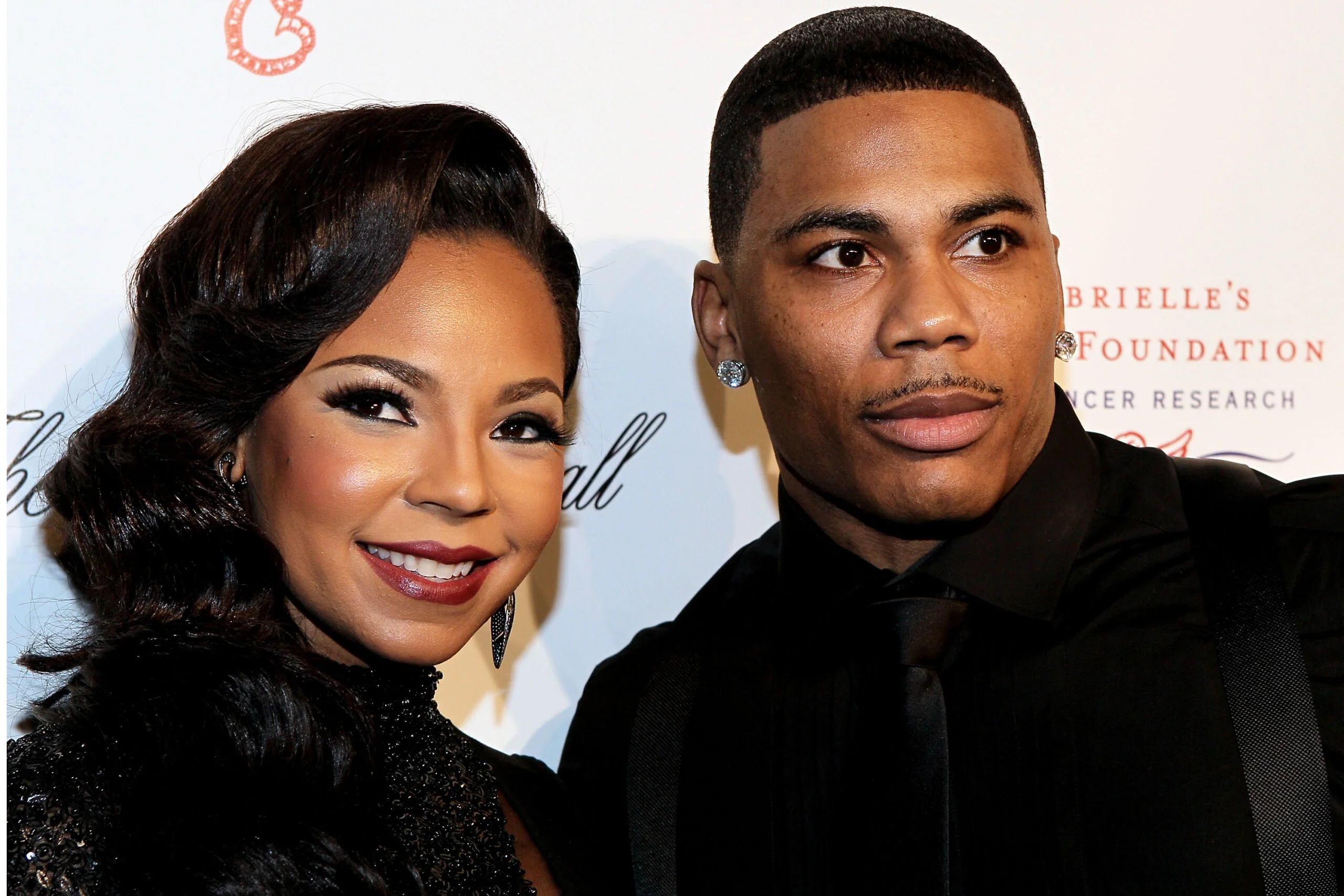 Ashanti Dances Affectionately With Nelly on Stage During Her